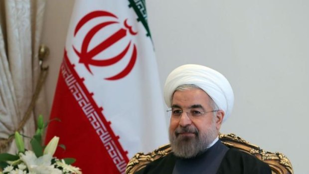 Sitting down for talks: Iranian President Hassan Rouhani.
