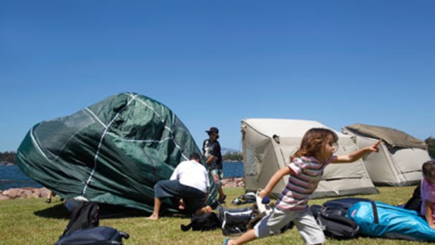 Pitch perfect ... families set up tents on Cockatoo Island.