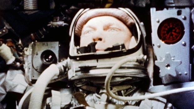 John Glenn pilots the "Friendship 7" Mercury spacecraft during his historic flight as the first American to orbit the Earth. 