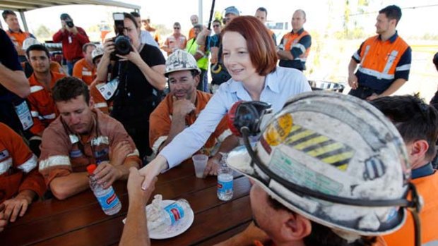 Prime Minister Julia Gillard meets workers at the Crinum coal mine near Emerald in Queensland yesterday.
