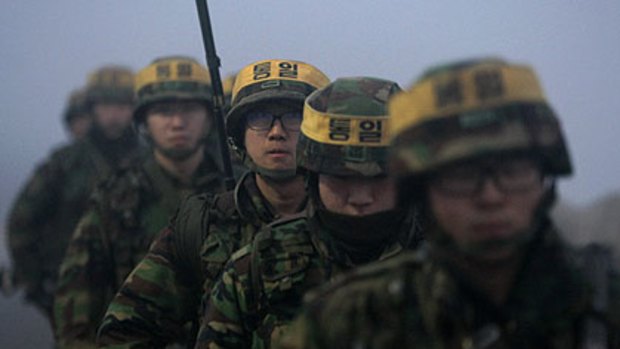 South Korean marines patrol Yeonpyeong island.