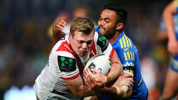 Promising player: Young halfback Drew Hutchinson heads for the line to score for the Dragons during the loss to the Parramatta Eels.