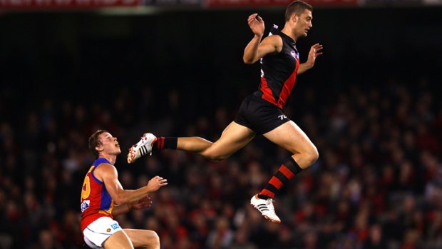 Pushed out... Tom Bellchambers, right, has been dropped from the Essendon team to face Fremantle this week.