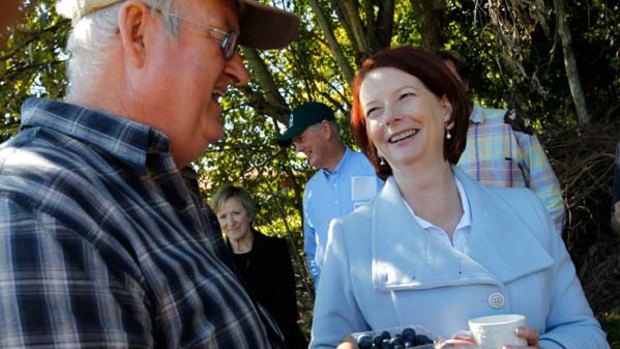 Julia Gillard meets blueberry farmer Ridley Bell on a visit to the Wollongbar Primary Industries Institute on the NSW north coast.
