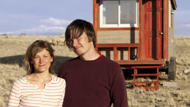 Christopher Smith and Merete Mueller outside their 11.5-square-metre abode.