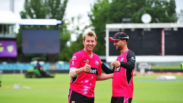 Brett Lee and Nathan Lyon share a joke ahead of Wednesday night's BBL final against the Perth Scorchers at Manuka Oval.