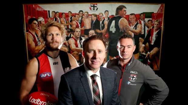 St Kilda lobbied the AFL for the league's first Pride game. Chief executive Matt Finnis (centre), pictured with Sam Gilbert and coach Alan Richardson, says the club will not be deterred by protests.