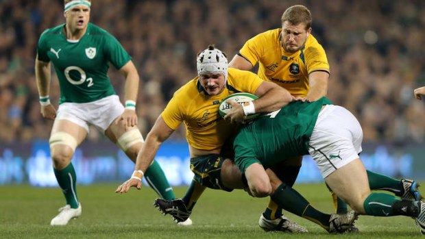 Ben Mowen is tackled by Cian Healy of Ireland in November.
