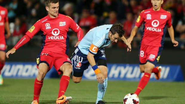 Sydney FC's Alessandro Del Piero tries to weave his way through the Adelaide defence.