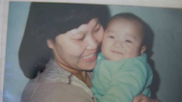 Painful memories: Baby picture of Xu Zijie.