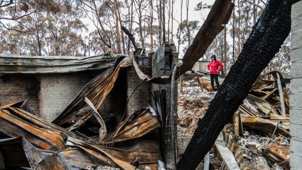 Wye River resident Sheryl Smith lost her home in the Christmas fires. She now faces the prospect of rebuilding the home to strict new construction standards, which she estimates will cost around $200,000 more than before