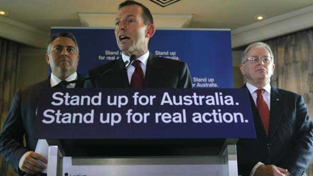 Tony Abbott flanked by Joe Hockey and Andrew Robb.