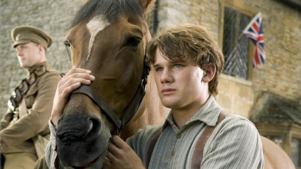 Saddle up: Albert (Jeremy Irvine) has a brief time with his beloved horse before it goes to battle in Steven Spielberg's stirring <i>War Horse</i>.