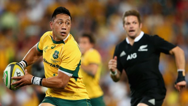 Attacking raid: Christian Leali'ifano makes a break against the All Blacks at Suncorp Stadium.