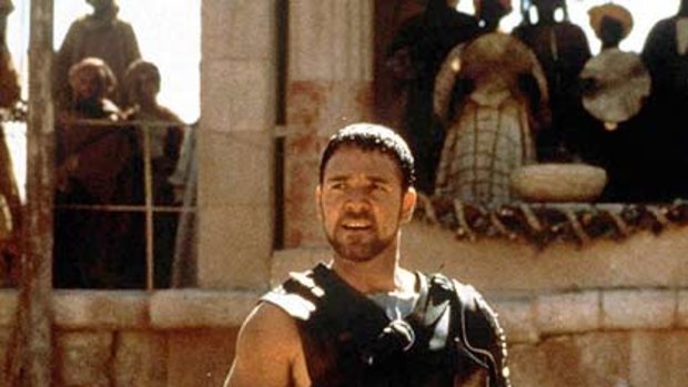 Menacing...New book claims Gladiator star Russell Crowe threatened to kill the film's producer.