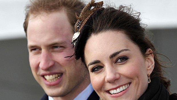 Kate Middleton, pictured with husband-to-be Prince William.
