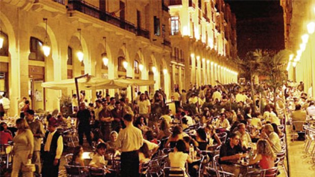 Tourists enjoy a night out in downtown Beirut.