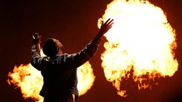 Still standing: Drake performs during the Future Music Festival.