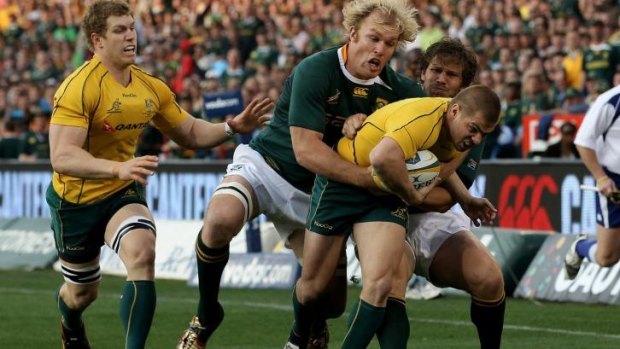 Schalk Burger gets to grips with Drew Mitchell back in 2011.