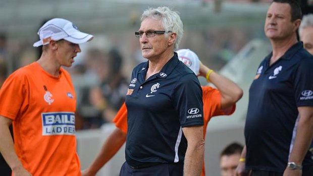 Carlton coach Mick Malthouse shows he is unhappy with the state of play.