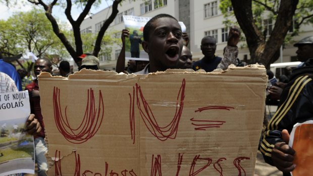 A demonstrator protests against UN peacekeeping troops in Congo for failing to protect civilians from rebel fighting. The UN has used surveillance drones in the Congo since 2013.