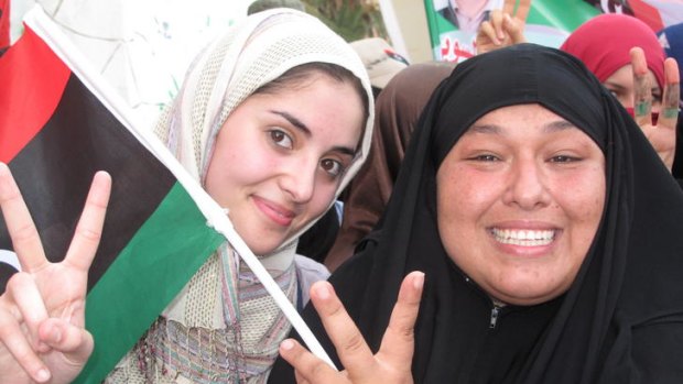 Zainab Dar Tarbau (left) and Manal al-Derb joined thousands of fierce, loud and proud women to celebrate at Martyr's Square.