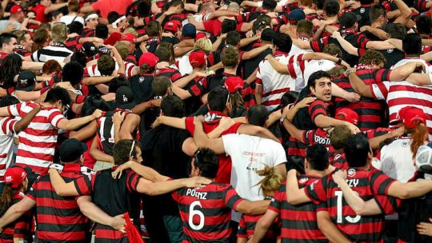 Standing room only: Wanderers fans dance and chant the night away.
