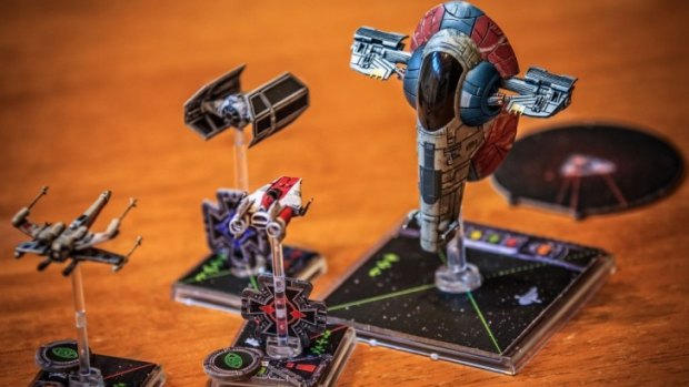 They're a bit pricey, but Star Wars fans will love the beautifully painted game pieces in the X-Wing miniatures game.