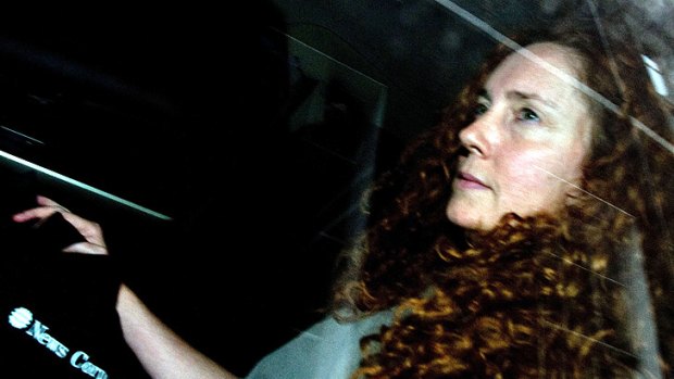 News International Chief Executive Rebekah Brooks is pictured behind her car's tinted windows as she leaves Rupert Murdoch's London home on July 12.