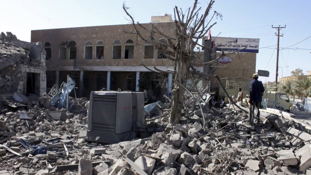The aftermath of an air strike in Yemen's north-western city of Saada.