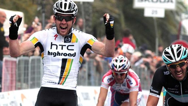 Matthew Goss celebrates after becoming the first Australian to win the Milan-San Remo classic.