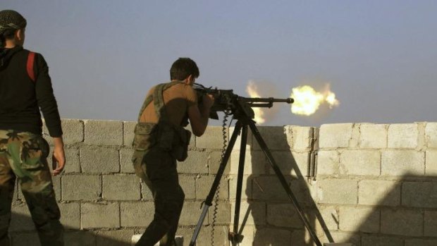 Fighting back: Syrian rebels attack Islamic State fighters near Aleppo.
