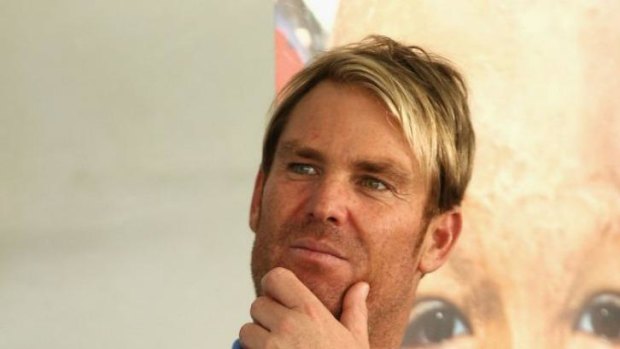 Shane Warne: happy to appear with new squeeze.
