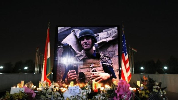 A photograph of James Foley, the freelance journalist killed by the Islamic State, is seen during a memorial service in Irbil, 350 kilometres north of Baghdad on Sunday.