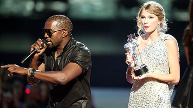 Controversial rant ... Kayne West on stage with Taylor Swift.