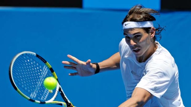 Fighting fit ... a rejuvenated Rafael Nadal practices at Hisense Arena in Melbourne yesterday.