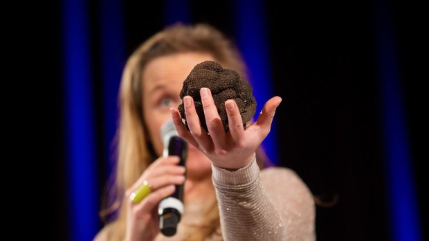 Louise Fitzroy auctions a 628-gram truffle from Stonebarn Truffles in Western Australia, which sold for $1300 at Truffle Melbourne.