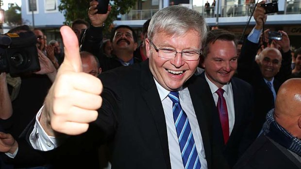 Thumbs up: Kevin Rudd on the campaign trail in western Sydney.