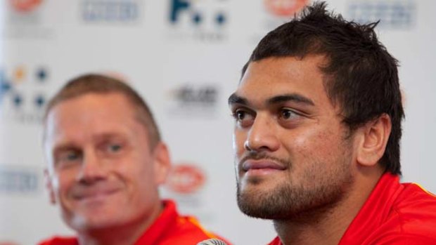 GCFC Coach Guy McKenna and Former Brisbane Broncos Karmichael Hunt at a press conference for the new Gold Coast Football Club.