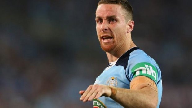 James Maloney was targeted by Maroons hardman Sam Thaiday.