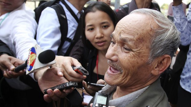 Bou Meng, a survivor of the Khmer Rouge S-21 prison, talks to the media in Phnom Penh.