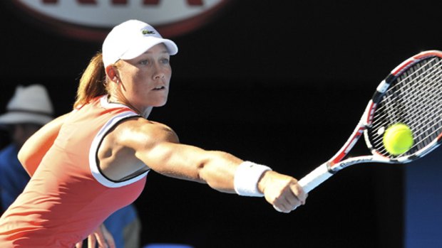Not the same league ... Samantha Stosur during yesterday's 6-4, 6-2 loss to defending champion Serena Williams.