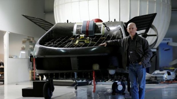 Rafi Yoeli, founder and CEO of Urban Aeronautics, stands next to a prototype of the Cormorant, a drone, at the company's workshop in Yavne, Israel.