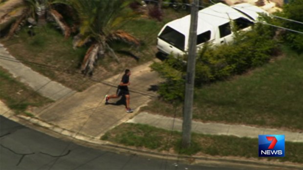 A man runs from police on the Gold Coast. Photo: Seven News.