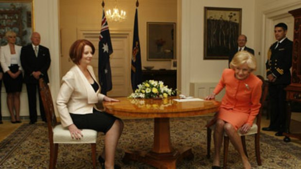 Oath of office ... Ms Gillard is sworn in.
