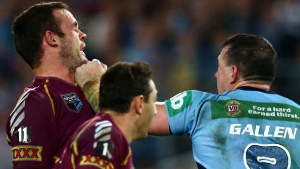 Banned for one match: Paul Gallen punches Nate Myles.