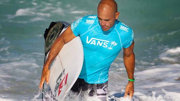 The man: Kelly Slater is bidding for a 12th world title in Hawaii this week before a likely retirement from surfing.
