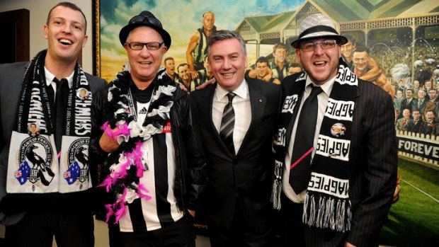 Pink Magpies Daniel Grey, Ian Bell and Jeremy Glover pictured with Collingwood president Eddie McGuire (third from left).