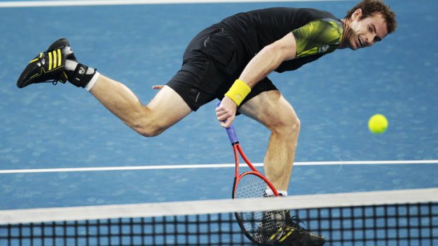 Andy Murray stretched during his match against Brisbane's John Millman.