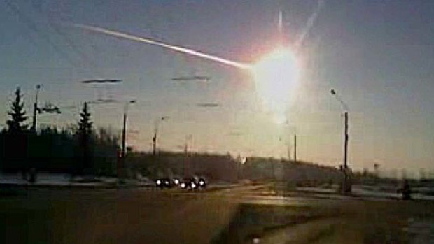 A meteor streaks through the sky over Chelyabinsk, Russia.
